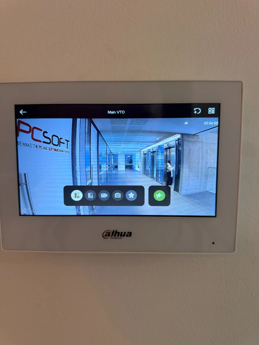 Video intercom monitor showing live entrance view